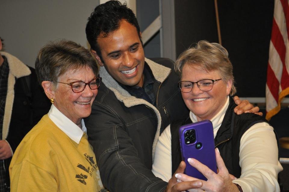 Presidential candidate Vivek Ramaswamy poses for a selfie after a town hall in Estherville, Iowa. At the event, he said: “We've gotten lazy as a party for a long time. We have been running from something. But now is our moment to actually start running to something. To our vision of what it means to be an American today.”