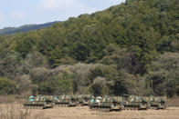 South Korean army K-9 self-propelled howitzers are seen in Paju, near the border with North Korea, South Korea, Tuesday, Oct. 19, 2021. North Korea fired at least one ballistic missile into the sea on Tuesday in a continuation of its recent weapons tests hours after the U.S. reaffirmed its offer to resume diplomacy on the North's nuclear weapons program. (AP Photo/Ahn Young-joon)