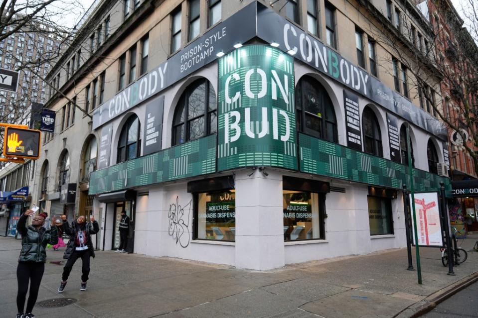 The city has been overrun by both legal (above) and illegal cannabis shop. AP