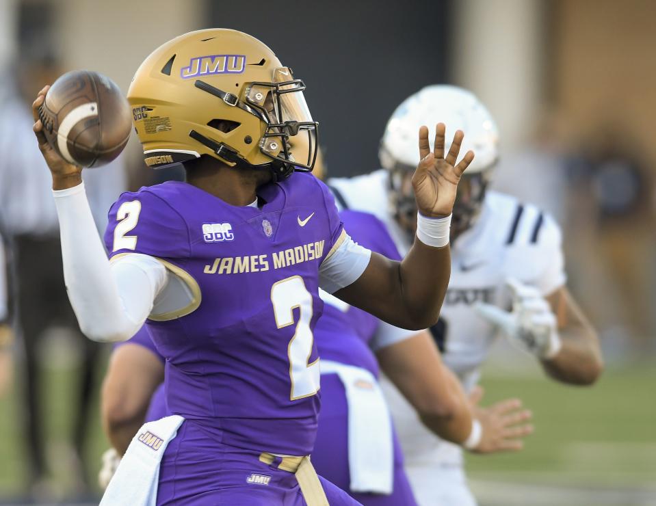 James Madison quarterback Jordan McCloud (2) throws a pass against Utah State during the first half of an NCAA college football game Saturday, Sept. 23, 2023, in Logan, Utah. | Eli Lucero/Herald Journal via AP