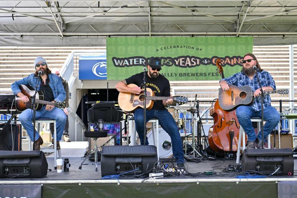 Channing Wilson, Rob Snyder & Dave Kennedy play live music Saturday during the Hoppy Valley Brewers Fest at Penn State’s Beaver Stadium. Jeff Shomo/For the CDT