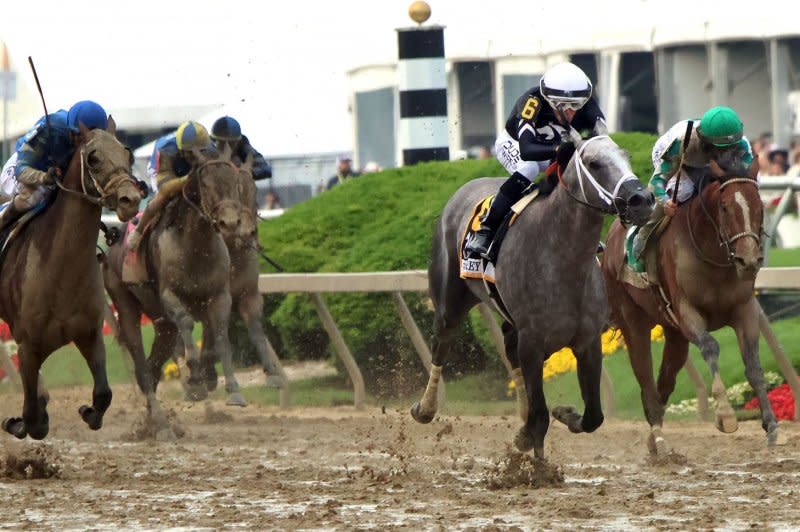 Seize the Grey,(No. 6), with Jaime Torres up, wins the 149th running of the Preakness Stakes at Pimlico Race Course on Saturday in Baltimore. Photo by Mark Abraham/UPI