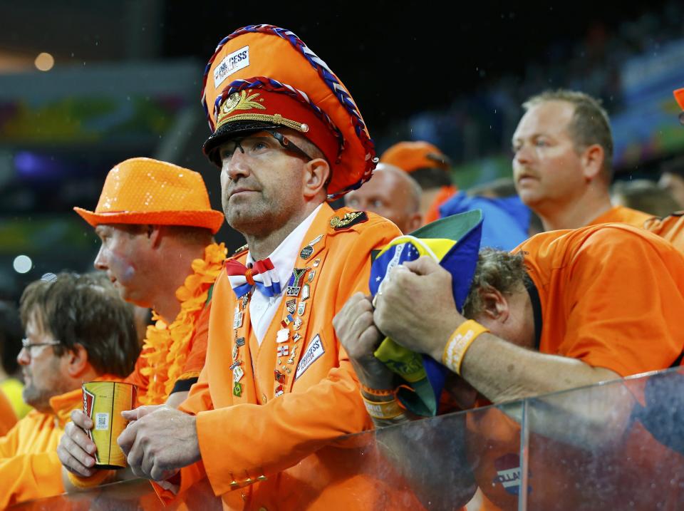 Netherlands' fans show dejection after the 2014 World Cup semi-finals against Argentina at the Corinthians arena in Sao Paulo July 9, 2014. REUTERS/Darren Staples