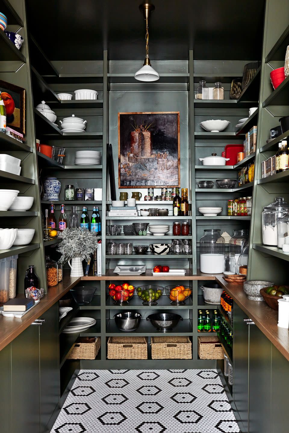 a kitchen with shelves full of dishes