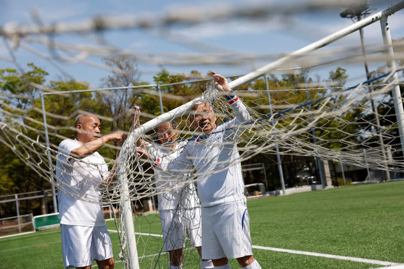 FILE PHOTO: The Wider Image: For Japan's ageing soccer players, 80 is the new 50