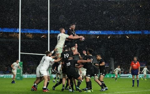 Kieran Read of New Zealand wins the lineout from George Kruis in the driving rain during the Quilter International match between England and New Zealand at Twickenham Stadium - Credit:  David Rogers /The RFU Collection