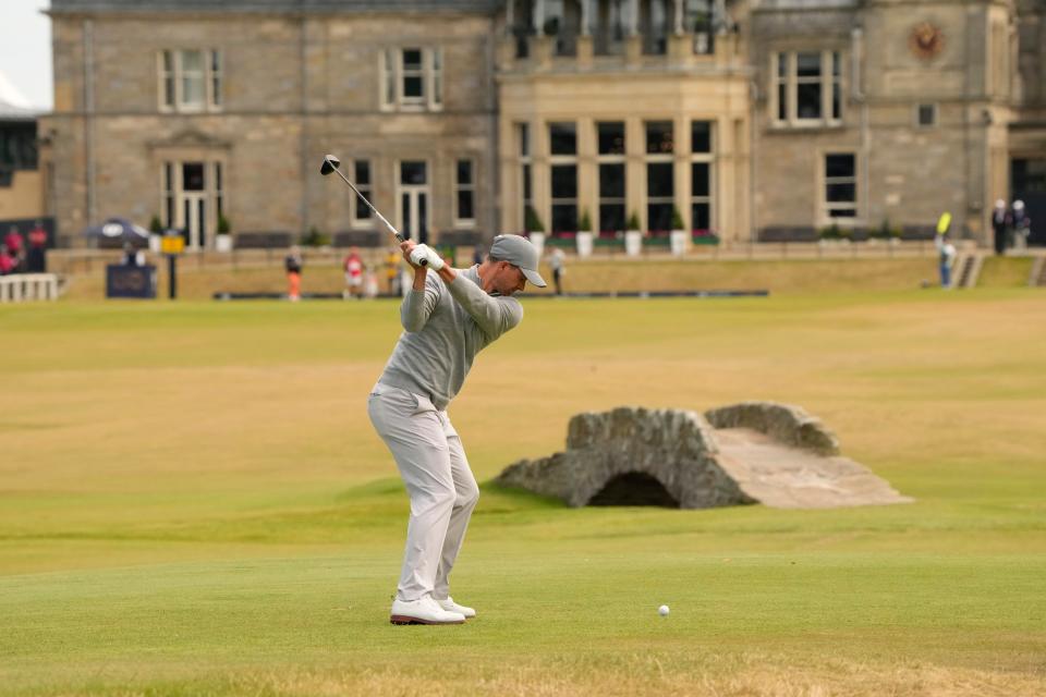 Adam Scott plays from the 18th tee July 15, 2022 at The Open Championship at St. Andrews in Scotland.