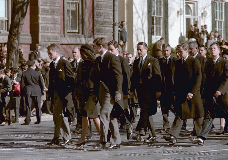 Jacqueline Kennedy, flanked by Robert Kennedy and Ted Kennedy, leads the processional to the funeral Mass for her husband, President John F. Kennedy, on Nov. 25, 1963.