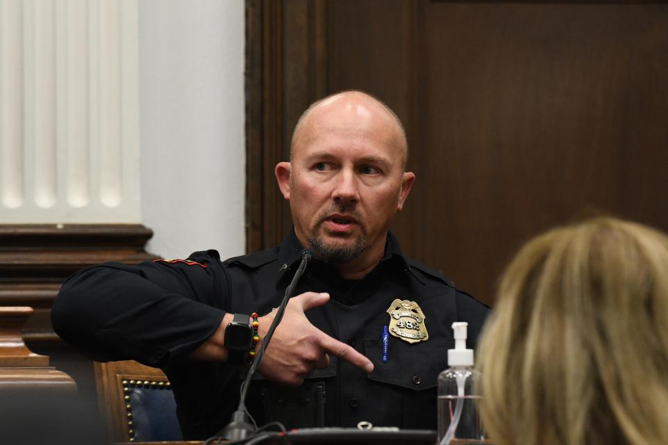 Kenosha Police evidence technician Jeffrey Van Wie testifies about taking swabs from rifles during the trial of Kyle Rittenhouse on Nov. 5, 2021 in Kenosha, Wisconsin. Rittenhouse is accused of shooting three demonstrators, killing two of them, during a night of unrest that erupted in Kenosha after a police officer shot Jacob Blake seven times in the back while being arrested in August 2020. Rittenhouse, from Antioch, Illinois, was 17 at the time of the shooting and armed with an assault rifle. He faces counts of felony homicide and felony attempted homicide.