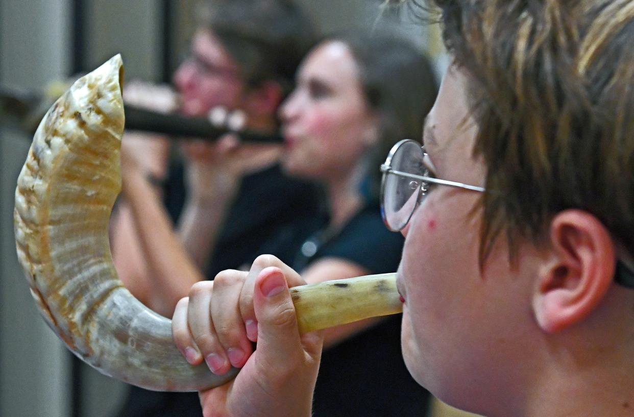 Caleb McCaffray, 10, of Sarasota, taking part in a Shofar class at Temple Sinai in Sarasota, preparing for the upcoming High Holy Days.