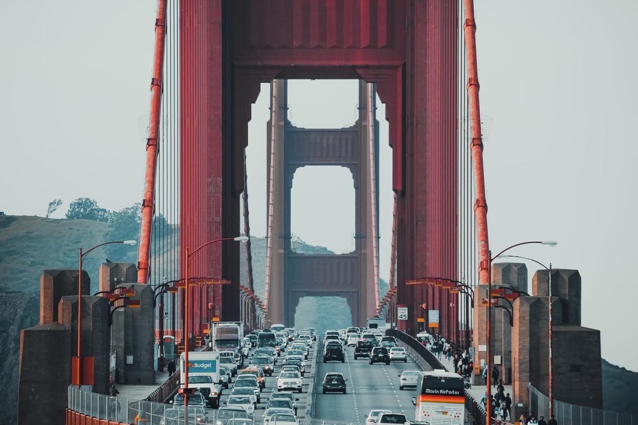 <span class="caption">The Golden Gate Bridge in San Francisco averages more than 100,000 vehicles daily.</span> <span class="attribution"><a class="link " href="https://unsplash.com/photos/tw1CjEGyUUI" rel="nofollow noopener" target="_blank" data-ylk="slk:Photo by Saketh Garuda for Unsplash;elm:context_link;itc:0;sec:content-canvas">Photo by Saketh Garuda for Unsplash</a></span>