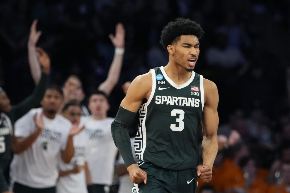 FILE - Michigan State guard Jaden Akins (3) reacts after a three-point basket in the second half of a Sweet 16 college basketball game against Kansas State in the East Regional of the NCAA tournament at Madison Square Garden, Thursday, March 23, 2023, in New York. Michigan State guards Jaden Akins and A.J. Hoggard have withdrawn from the NBA Draft. The basketball program announced the duo’s decision with a Twitter post on Wednesday, May 31, 2023. (AP Photo/Frank Franklin II, File)