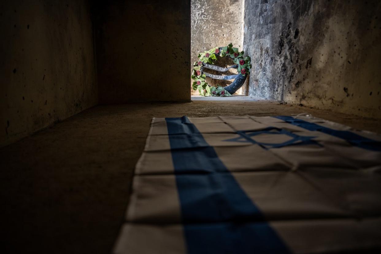 A memorial is left inside a bomb shelter near the Supernova music festival, where eyewitnesses reported Hamas members gang-raping and killing women. <a href="https://www.gettyimages.com/detail/news-photo/makeshift-memorial-is-left-inside-a-bomb-shelter-near-where-news-photo/1791613498?adppopup=true" rel="nofollow noopener" target="_blank" data-ylk="slk:Alexi J. Rosenfeld/Getty Images;elm:context_link;itc:0;sec:content-canvas" class="link ">Alexi J. Rosenfeld/Getty Images</a>