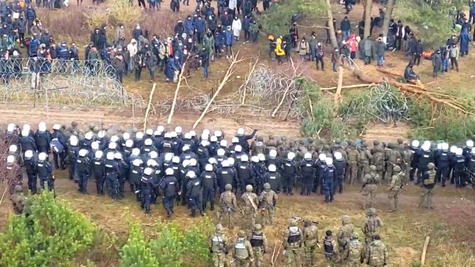 Hundreds of migrants try to cross from the Belarus side of the border with Poland near Kuznica Bialostock (via REUTERS)