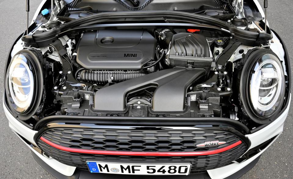 <p>A stiffening strut-tower brace has been added to the Clubman JCW in order to better accommodate its greater performance capabilities.</p>