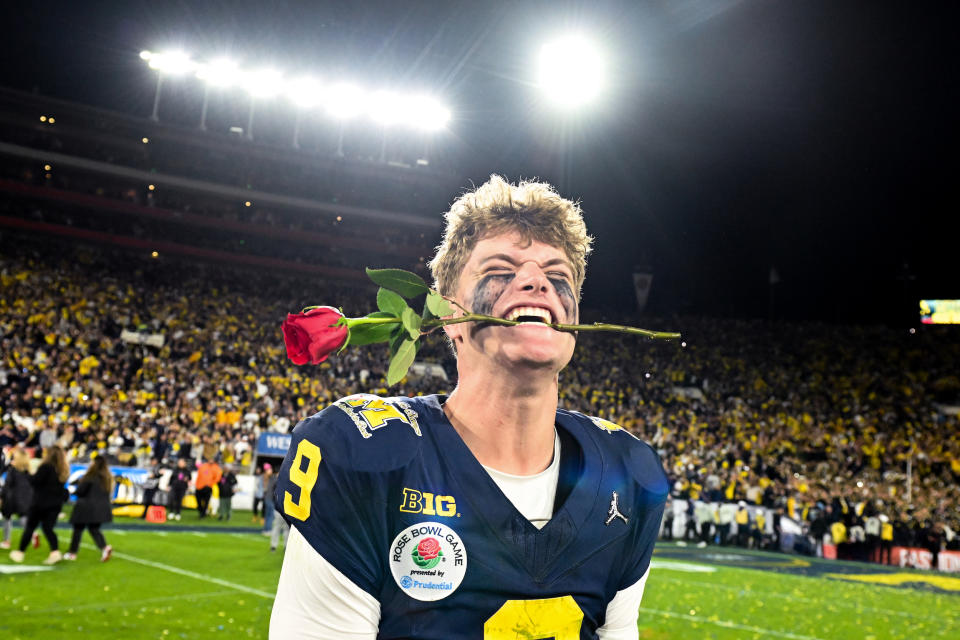 Michigan QB J.J. McCarthy celebrates winning the Rose Bowl. (Wally Skalij/Los Angeles Times via Getty Images)