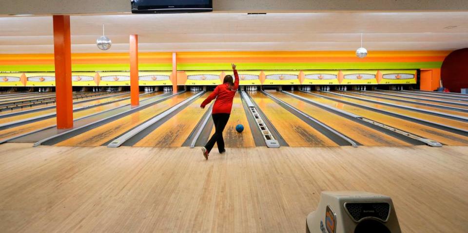 In this 2016 file photo, N.C. State freshman Gabrielle Faulkner gets some last practice in during bowling class at The Alley on Hillsborough St. in Raleigh in November 2016.