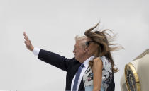 <p>President Donald Trump and First Lady Melania Trump board Air Force One at Orly Airport in Paris, Friday, July 14, 2017, en route to Bedminster, N.J., after attending the Bastille Day parade on the Champs Elysees avenue in Paris. (Photo: Carolyn Kaster/AP) </p>