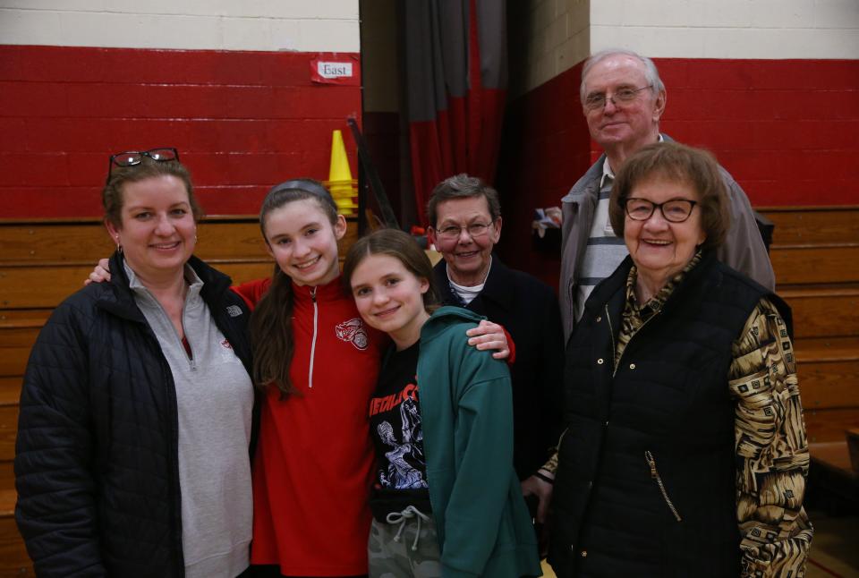 Red Hook's Maddie Clements with her family, from left, mother Eleanor, sister Gracyn, great aunt & uncle Connie and Bill Brewer, and grandmother Eleanor Lydon after a game versus Wallkill on January 12, 2024.