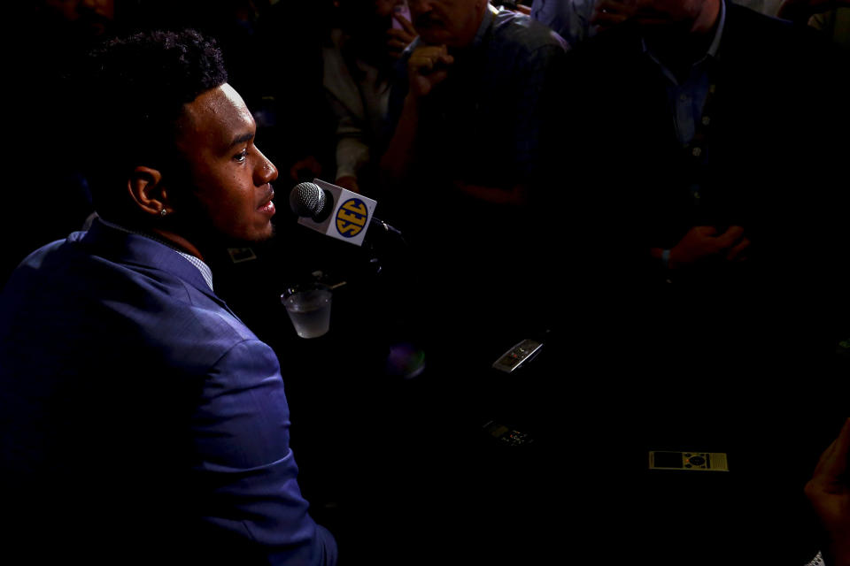Alabama quarterback Tua Tagovailoa speaks to reporters during the NCAA college football Southeastern Conference Media Days, Wednesday, July 17, 2019, in Hoover, Ala. (AP Photo/Butch Dill)