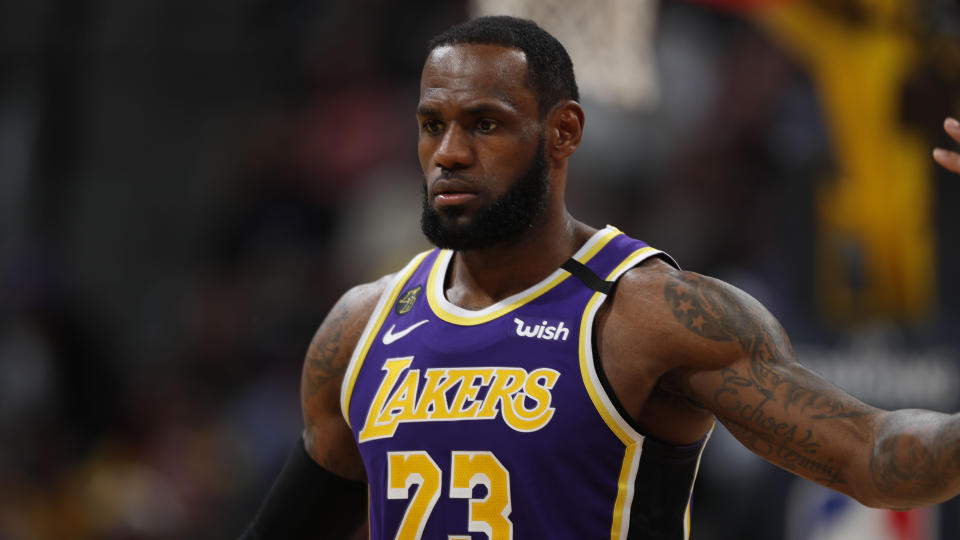 LeBron James is open to creative ways to play during the shutdown, but can't imagine how it would feel without fans. (AP Photo/David Zalubowski)