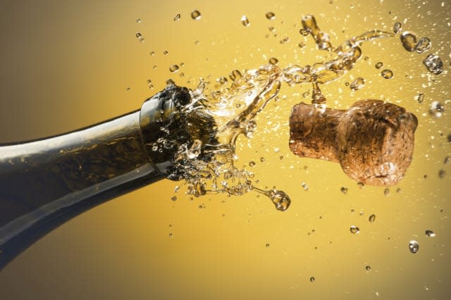 Champagne bottle and cork, computer illustration.