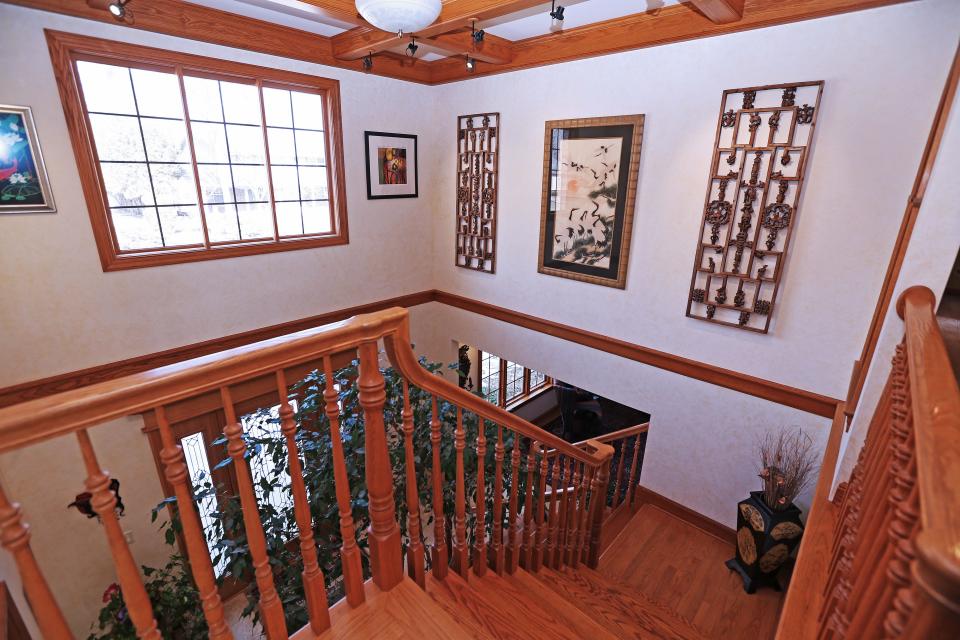 The old staircase was demolished and this staircase was built to improve the flow at the  Bayside home of Linda Even and husband Scott Kania.