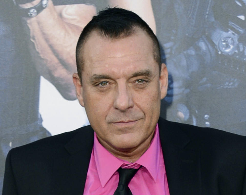 FILE - Actor Tom Sizemore arrives at the premiere of "The Expendables 3," in Los Angeles, Aug. 11, 2014. Sizemore, the “Saving Private Ryan” actor whose bright 1990s star burned out under the weight of his own domestic violence and drug convictions, died Friday, March 3, 2023, at age 61. (Photo by Jordan Strauss/Invision/AP, File)