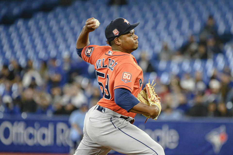 Houston Astros starting pitcher Framber Valdez throws during the first inning of a baseball game against the Toronto Blue Jays in Toronto, Sunday, May 1, 2022. (Christopher Katsarov/The Canadian Press via AP)