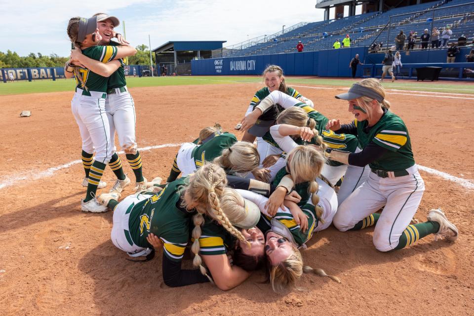 Stuart players celebrate after winning the Class B Fast Pitch Softball State Championship game against Whitesboro, Saturday, Oct. 8, 2022, at USA Softball Hall Of Fame Stadium in Oklahoma City.