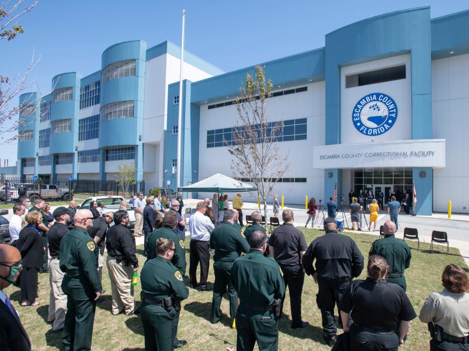 A ribbon cutting ceremony is held March 29 at the new Escambia County Correctional Facility in Pensacola. Whitesell-Green/Caddell, the company that built the $142 million facility, has filed a lawsuit against Escambia County over withholding a $3.4 million payment for the new jail. The county is withholding the money because it says the company was 224 days late in completing the jail.