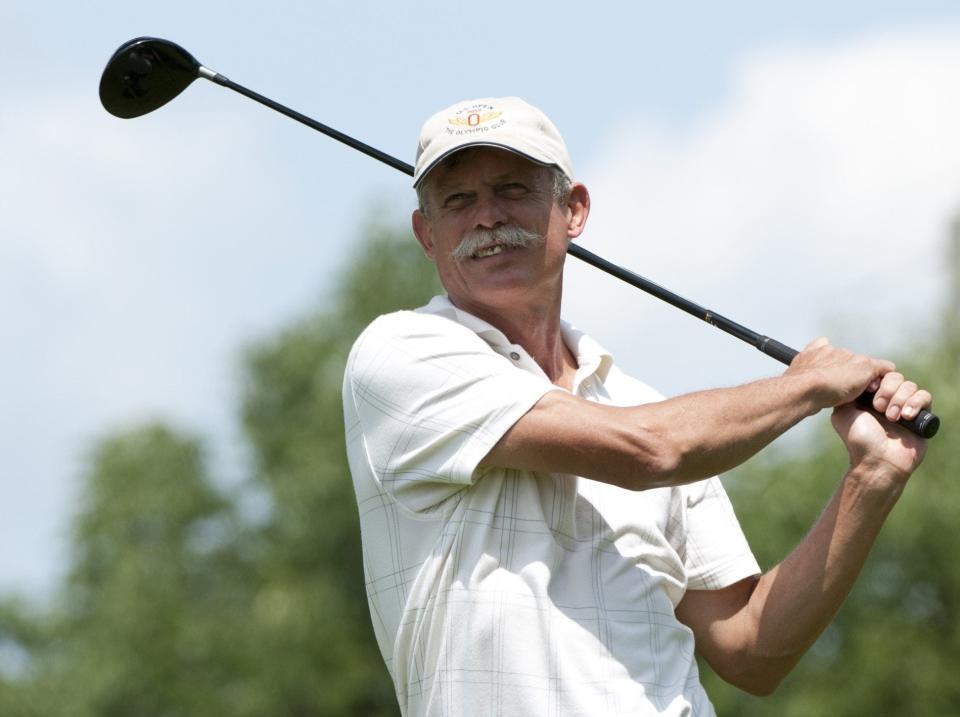 Dick Meacham tees off during the final round of the City Golf Tournament on Sunday, July 20.