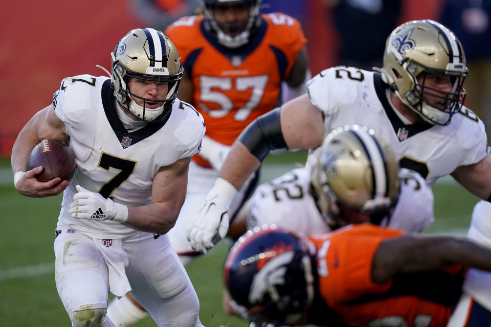 New Orleans Saints quarterback Taysom Hill (7) runs in for a touchdown during the first half of an NFL football game against the Denver Broncos, Sunday, Nov. 29, 2020, in Denver. (AP Photo/David Zalubowski)