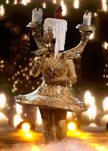 <p>Michael Becker / FOX</p> Candelabra performing on 'The Masked Singer' season 10.