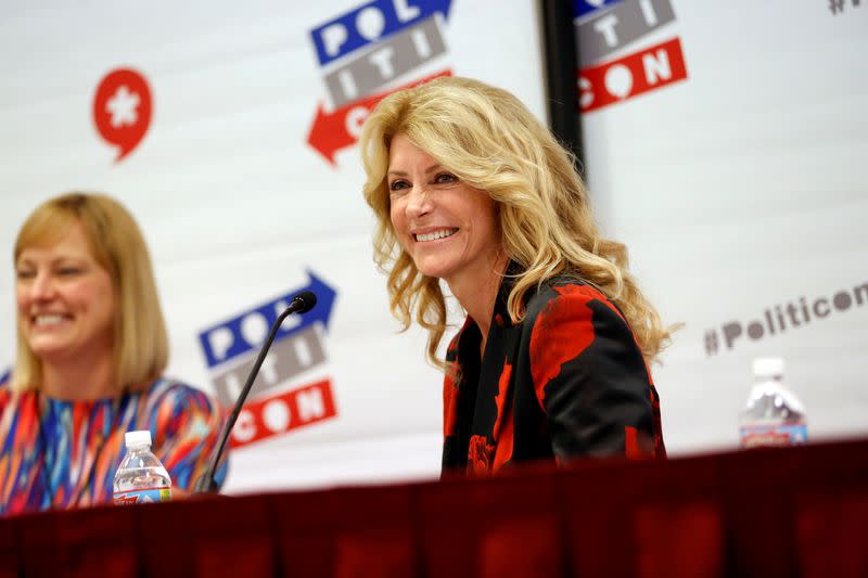 FILE PHOTO: Former Texas state Senator Wendy Davis smiles during the "Politicon" convention in Pasadena, California