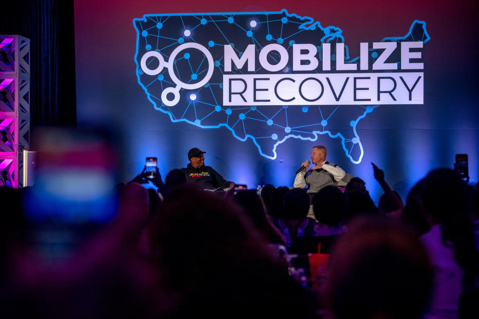 Macklemore (right) at Mobilize Recovery.  / Credit: Hilary Swift