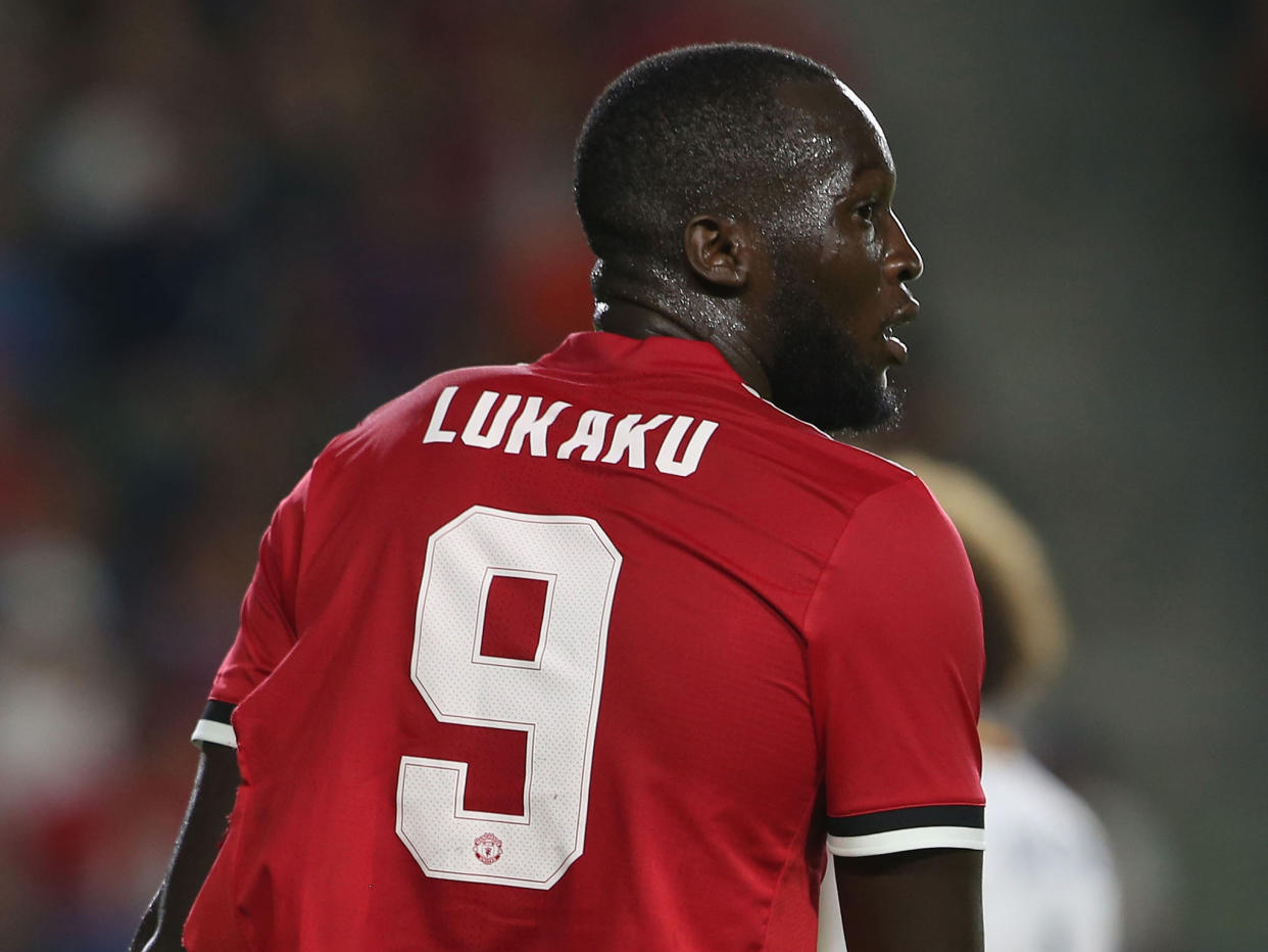 Romelu Lukaku is frequently seen celebrating goals by making the Christian cross sign on his chest: Getty