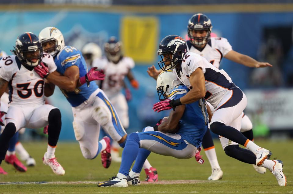 SAN DIEGO, CA - OCTOBER 15: Matt Willis #12 of the Denver Broncos tackles Eddie Royal #11 of the San Diego Chargers in the first quarter during the NFL game at Qualcomm Stadium on October 15, 2012 in San Diego, California. (Photo by Jeff Gross/Getty Images)