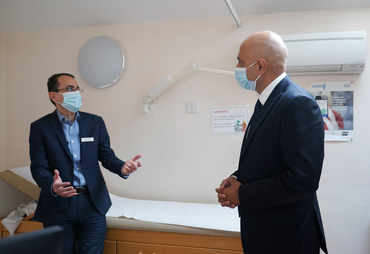 Health Secretary Sajid Javid (right) meeting Dr Ali al-Bassam, during a visit to the Vale Medical Centre in Forest Hill, south east London, following the announcement of the blueprint for improving access to GP appointments and supporting GPs and their teams. Picture date: Thursday October 14, 2021.