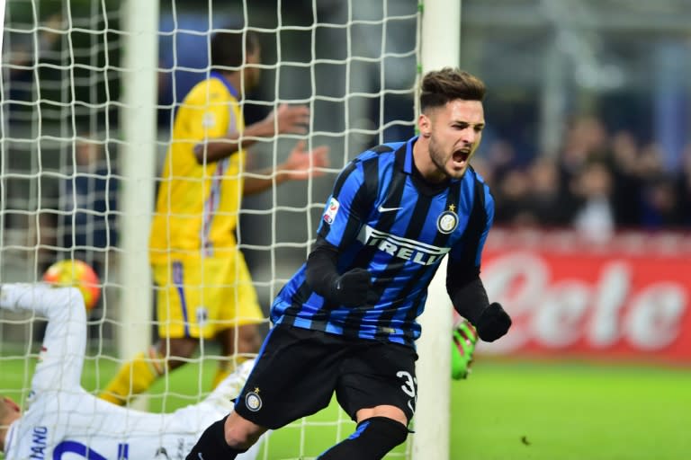 Inter Milan's defender from Italy Danilo D'Ambrosio celebrates after scoring a goal during the Italian Serie A football match against Sampdoria at San Siro Stadium in Milan on Febrauary 20, 2016