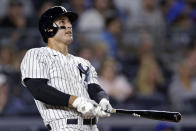 New York Yankees' Anthony Rizzo watches his home run during the fifth inning of the team's baseball game against the Chicago Cubs on Saturday, June 11, 2022, in New York. (AP Photo/Adam Hunger)