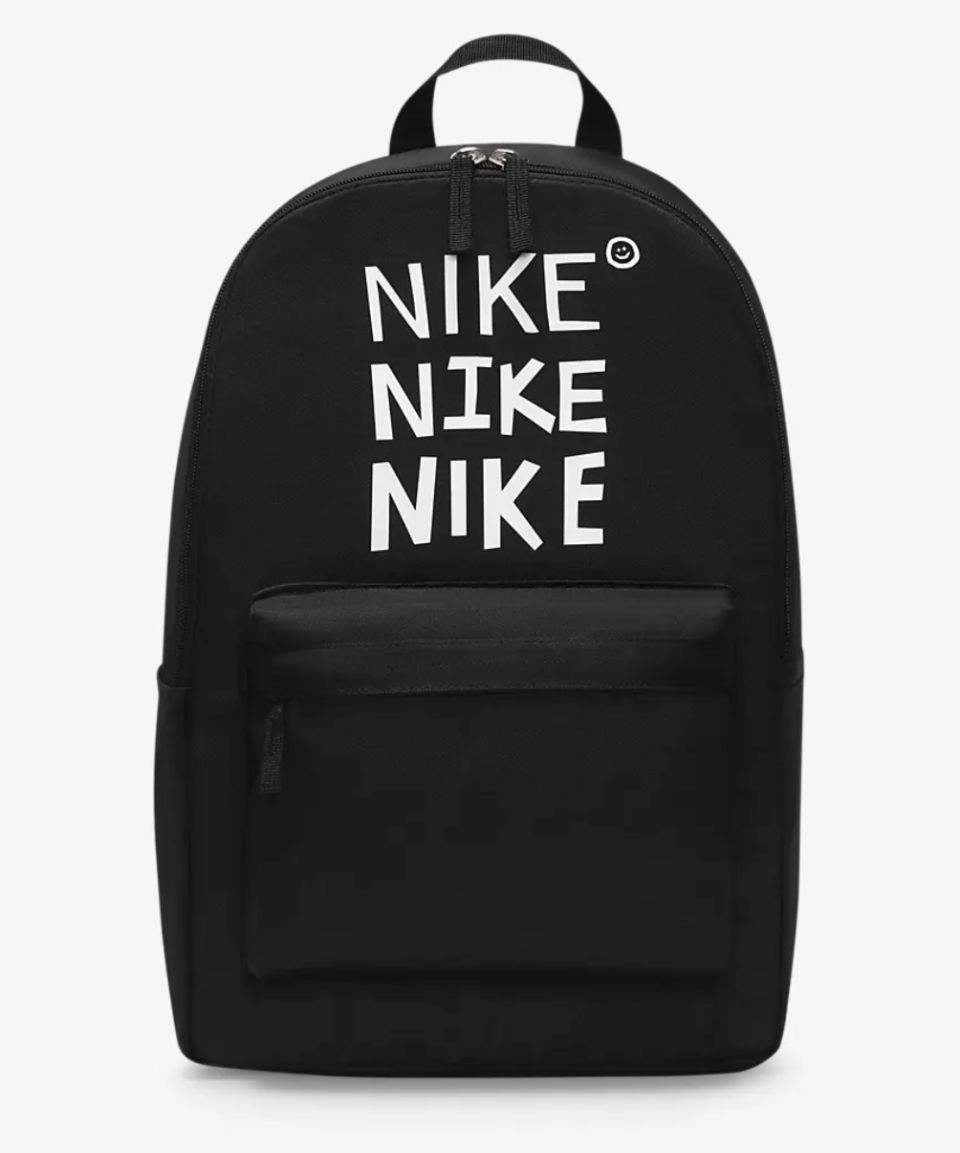 Nike Heritage Backpack in black with nike logo lettering in bold white (Photo via Nike)