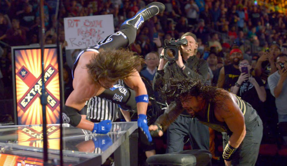 Reigns tosses Styles