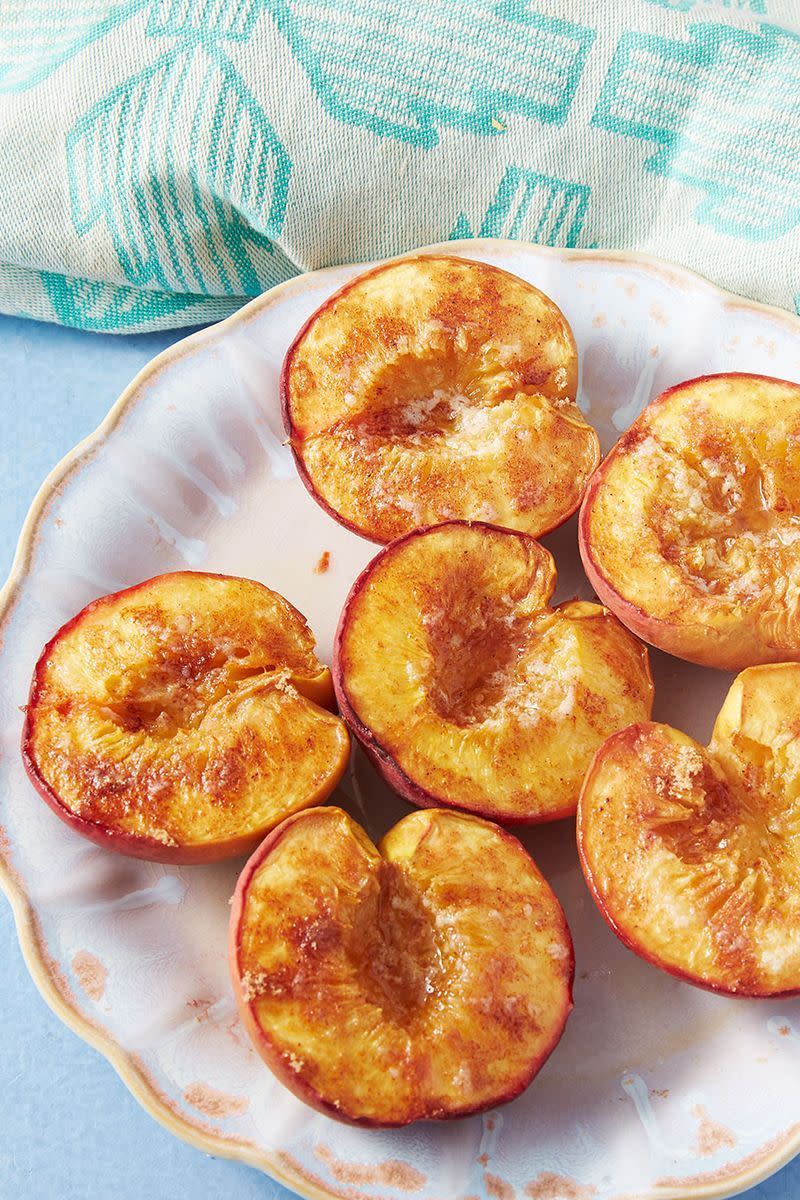 <p>These baked peaches are roasted low and slow to bring out all their natural sweetness. That means, even if your peaches aren't perfectly ripe, they'll still be super delicious.</p><p>Get the <a href="https://www.delish.com/uk/cooking/recipes/a29954651/baked-peaches-recipe/" rel="nofollow noopener" target="_blank" data-ylk="slk:Baked Peaches;elm:context_link;itc:0;sec:content-canvas" class="link ">Baked Peaches</a> recipe.</p>