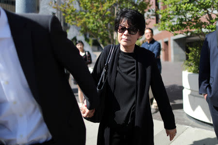 The mother of Christopher Ahn, the former US Marine who is a suspect in the raid by a dissident group on the North Korean Embassy in Madrid, walks out of federal court after a detention hearing in Los Angeles, California, U.S., April 23, 2019. REUTERS/Lucy Nicholson