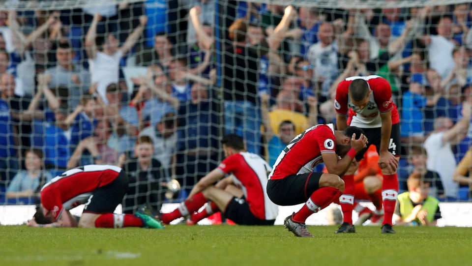 Head in hands: Southampton’s players look dejected after Everton’s Tom Davies levelled