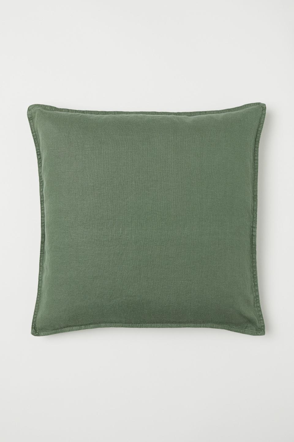 What I wanted: five big, squishy linen throw pillows to line up along the back of a sofa. What I didn't want: to spend $500. Linen is so expensive! Which is how I ended up on H&M's home section, piling a bunch of these 100-percent linen cushion covers into my cart for $13 a pop (I got a kind of rusty-blush, but they've got seven other great colors). It felt like stealing. Stuffed with down inserts I got on Amazon, they actually look fancy—and they didn't even shrink when I washed them! <strong>—Amanda, Clever design editor</strong><br> <a rel="nofollow noopener" href="http://www2.hm.com/en_us/productpage.0502190023.html" target="_blank" data-ylk="slk:SHOP NOW;elm:context_link;itc:0;sec:content-canvas" class="link ">SHOP NOW</a>: 20" x 20" Washed linen cushion cover by H&M, $13, hm.com