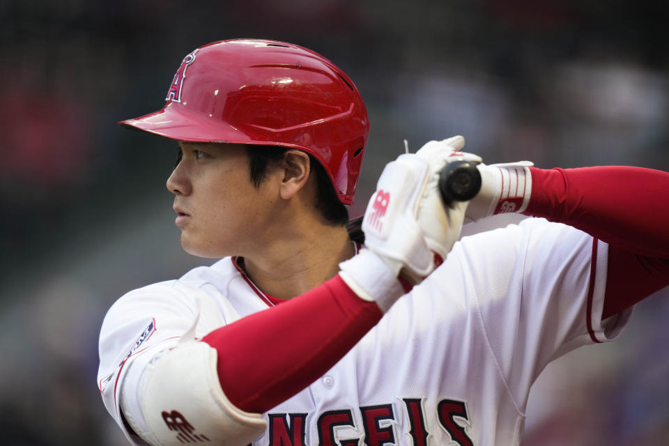 Los Angeles Angels' Shohei Ohtani gets ready for his at-bat during the first inning of the team's baseball game against the Chicago Cubs on Tuesday, June 6, 2023, in Anaheim, Calif. (AP Photo/Jae C. Hong)