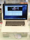 BERLIN, GERMANY - NOVEMBER 06: An Apple MacBook Pro laptop computer with Retina display stands on a table at a Gravis Apple retailer on November 6, 2012 in Berlin, Germany. Apple is hoping for a strong Christmas season. (Photo by Sean Gallup/Getty Images)