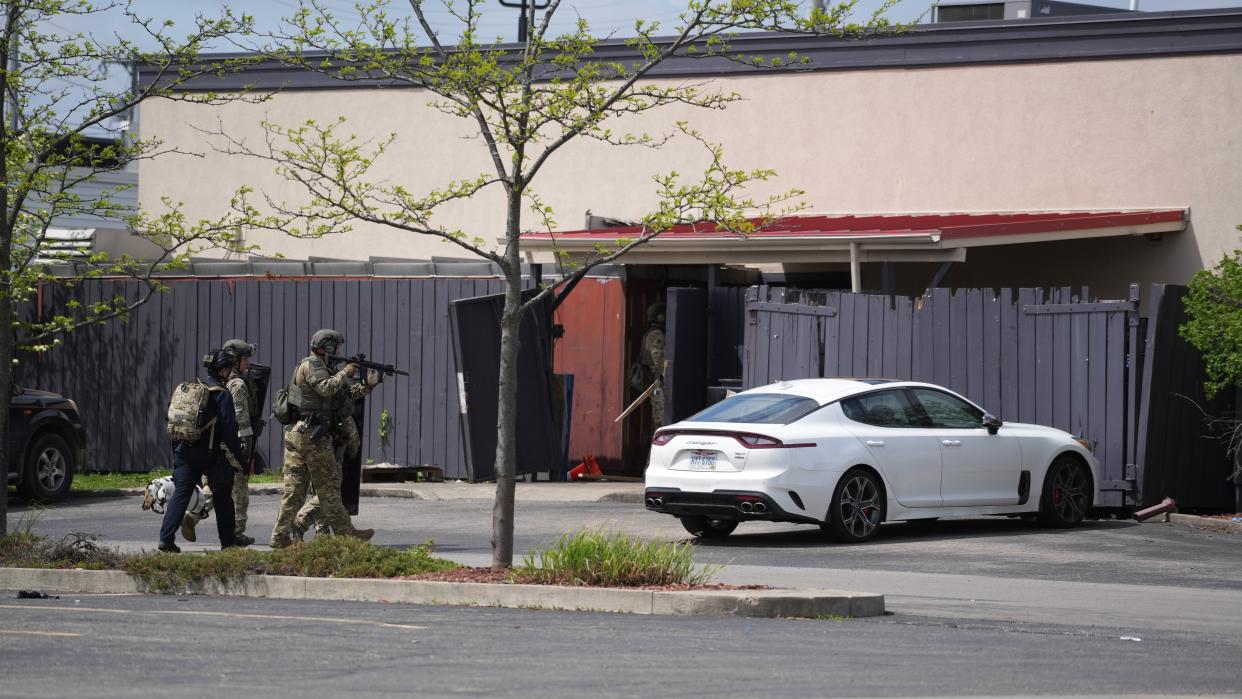 Columbus police SWAT officers cleared out Sunset Palace Banquet Hall on Sunday following a fatal shooting in the parking lot of the Columbus Square Shopping Center in the 5700 block of Cleveland Avenue.